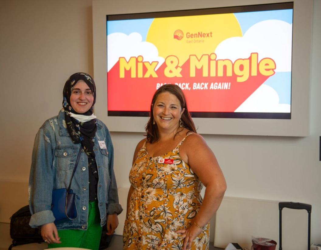 A photo of two people standing together at a GenNext Mix & Mingle event.